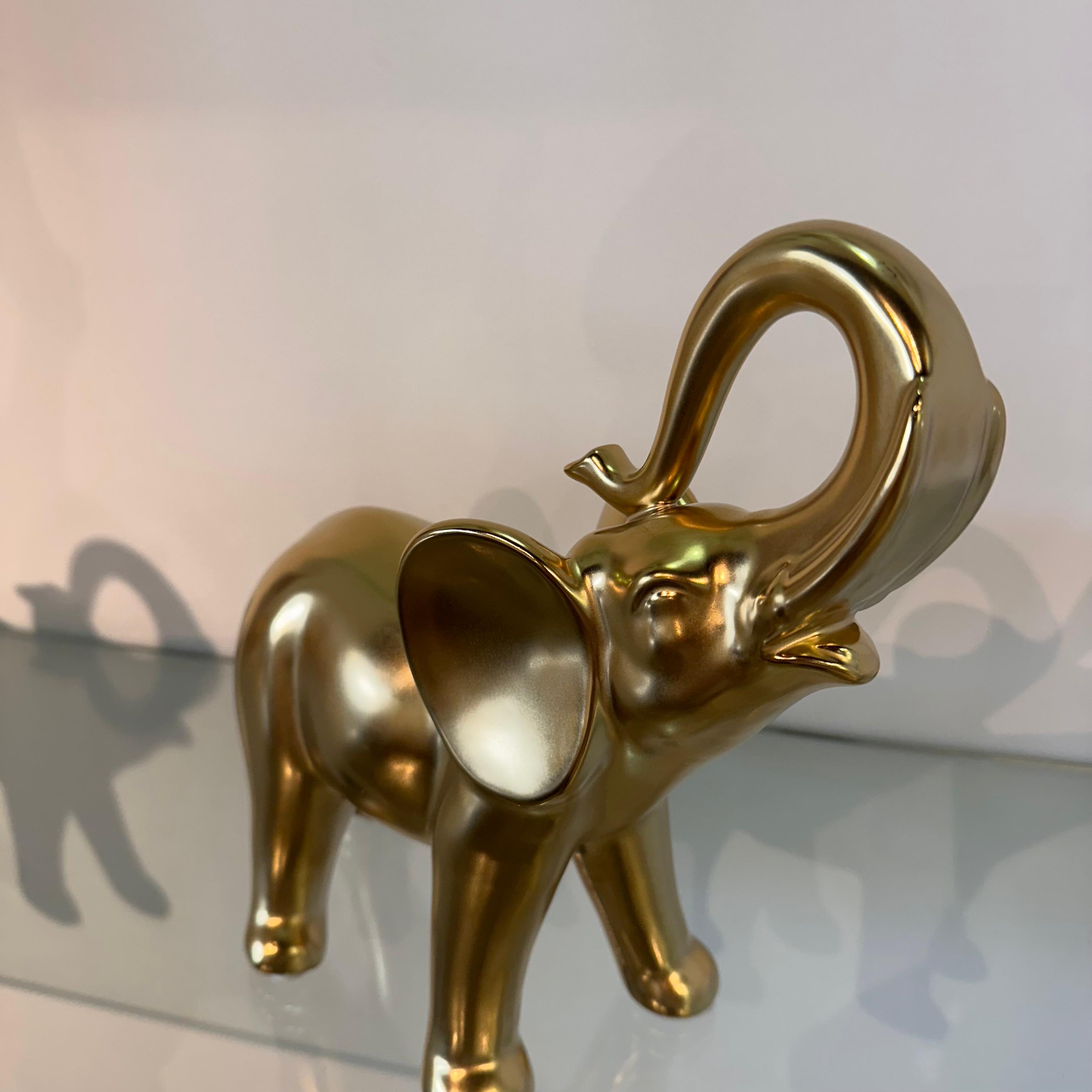 ACCESORIO -ÉLÉPHANT DORÉ DE FORTUNE